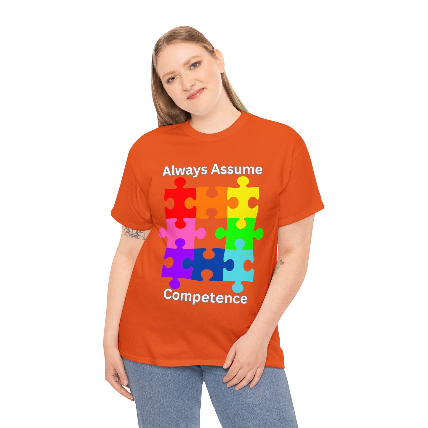 Always Assume Competence Unisex Heavy Cotton Tee